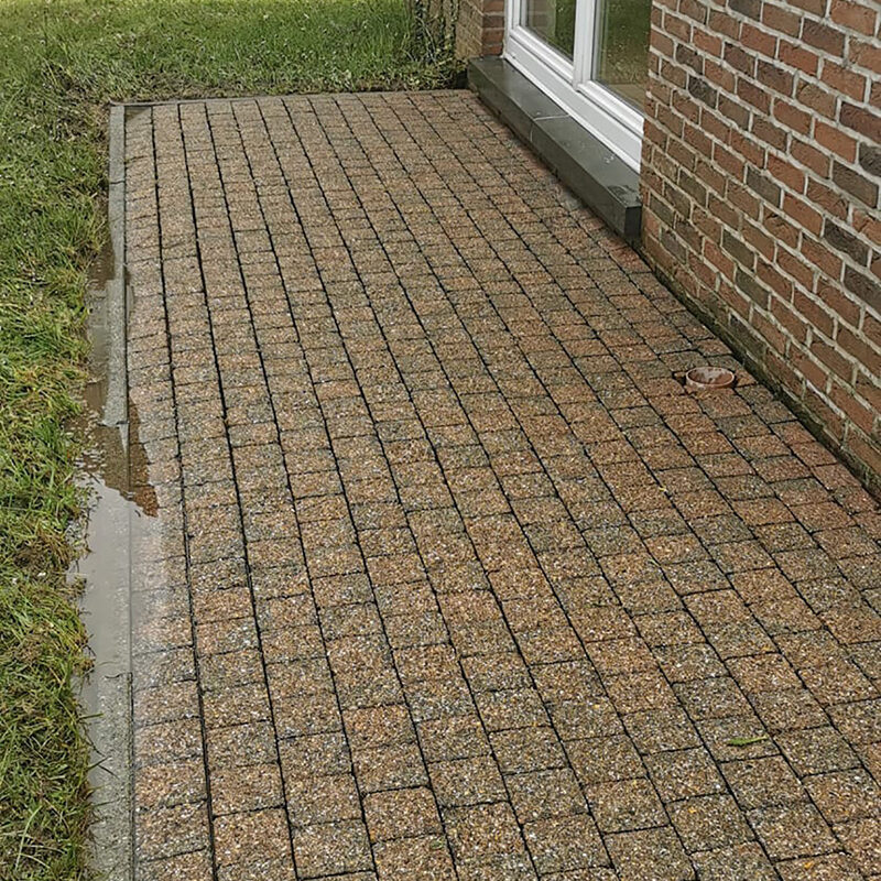 Le nettoyage d'une terrasse après le passage de l'équipe North Group