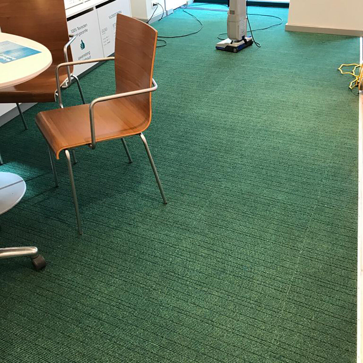 Nettoyage moquette d'un bureau après le passage de North Group